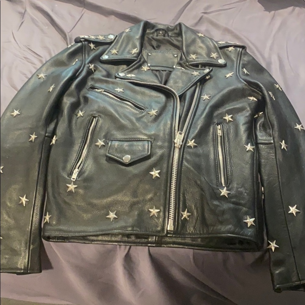 women’s star “UNDERSTATED” never worn, leather!